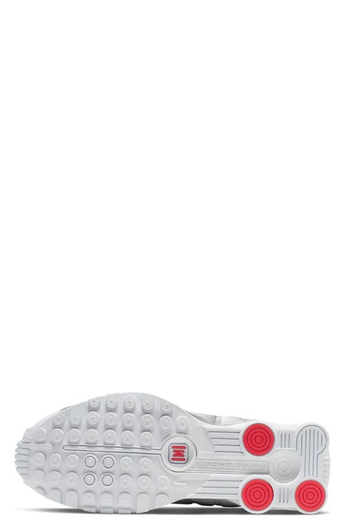 Shop Nike Shox R4 Sneaker In White/silver/max Orange