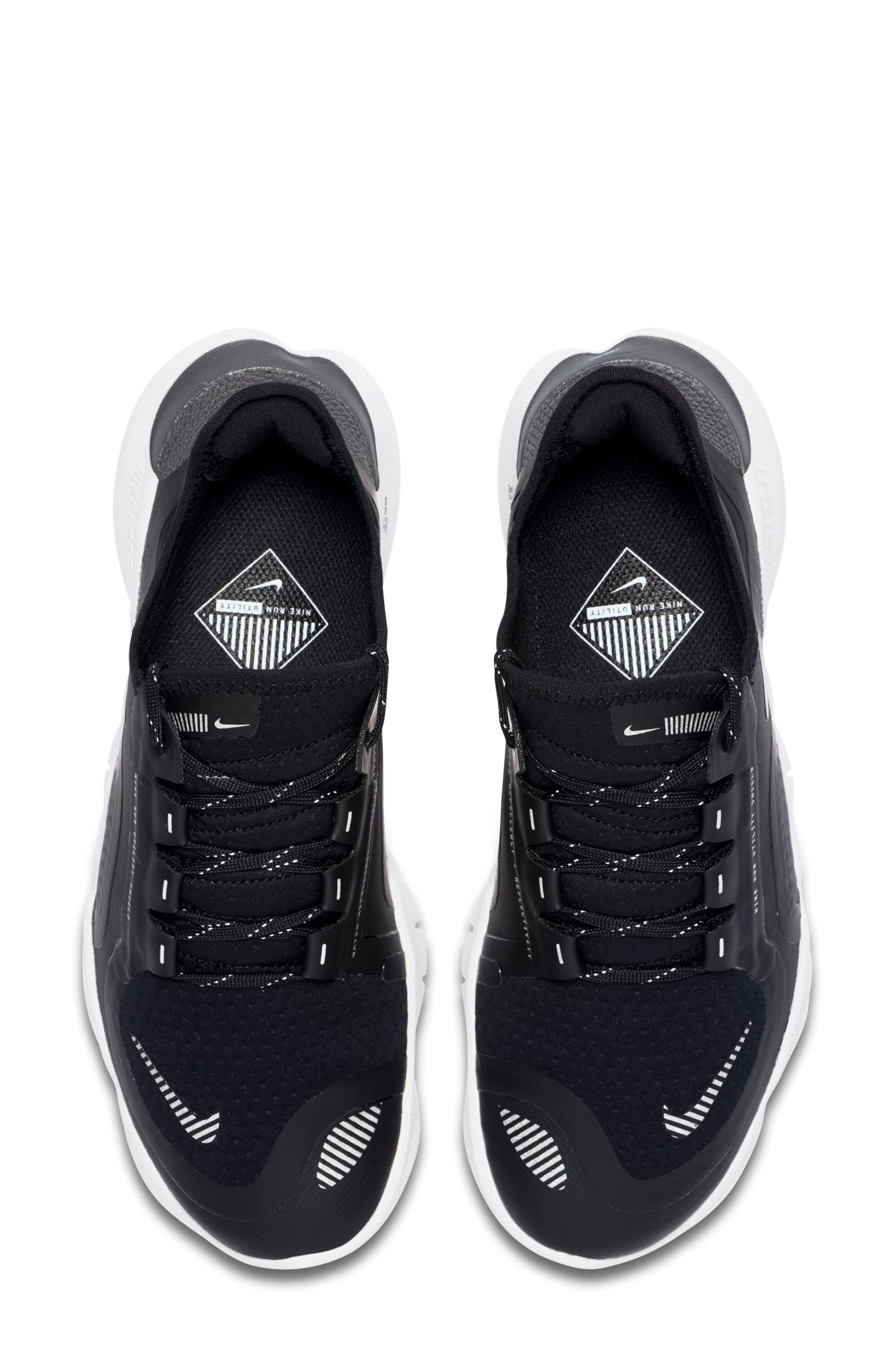 free rn 5.0 shield water repellent running shoe