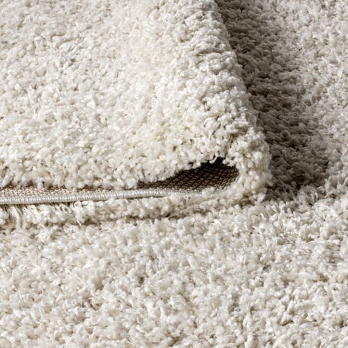 Jonathan Y Mercer Shag Plush Tassel Area Rug In Cream