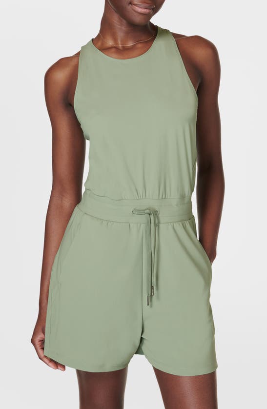 Shop Sweaty Betty Explorer Racerback Romper In Savannah Green