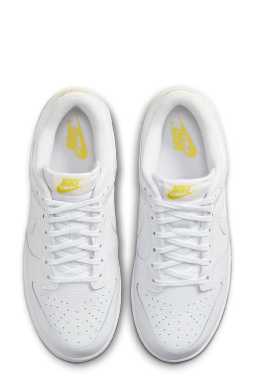 Shop Nike Dunk Low Basketball Shoe In White/sail/opti Yellow