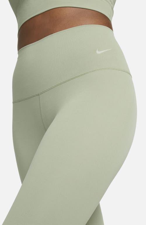 Shop Nike Zenvy Gentle Support High Waist Crop Leggings In Oil Green/black