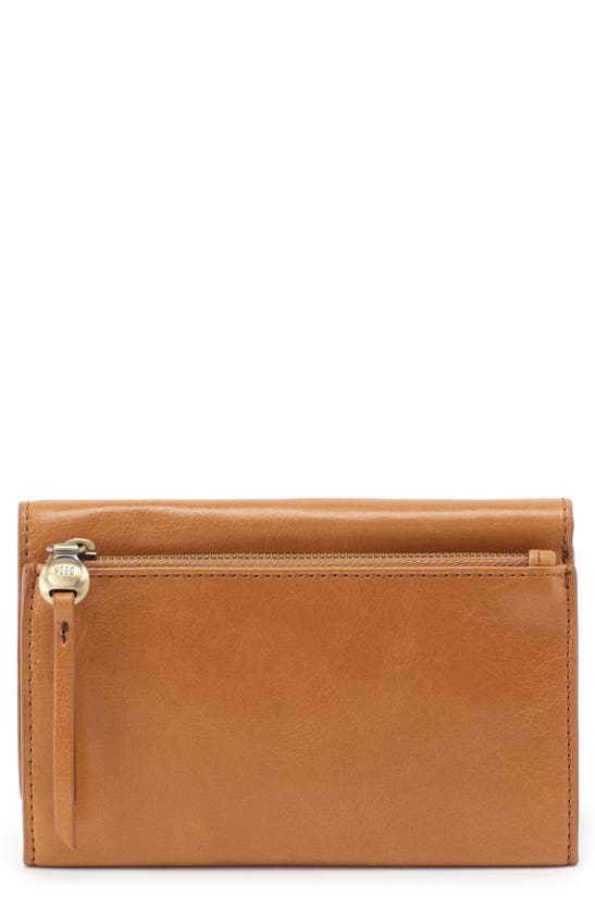 Click to view more detailed imagery on our partner's website Hobo Might Leather Trifold Wallet In Honey