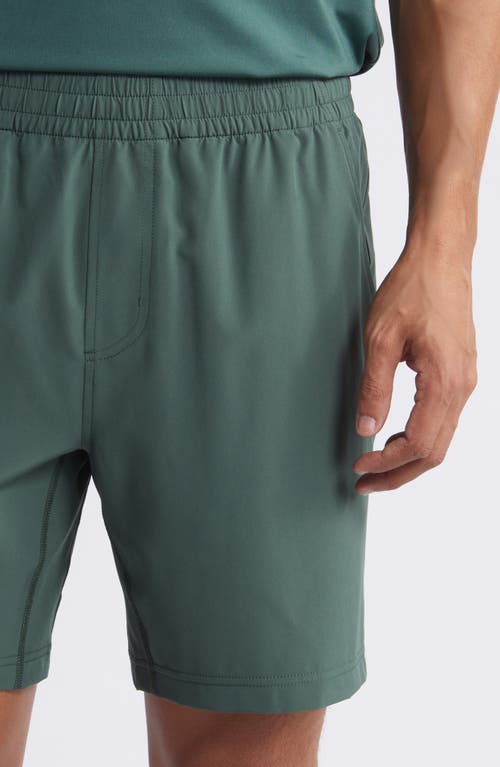 Shop Rhone Essentials 7-inch Gym Shorts In Jungle Green