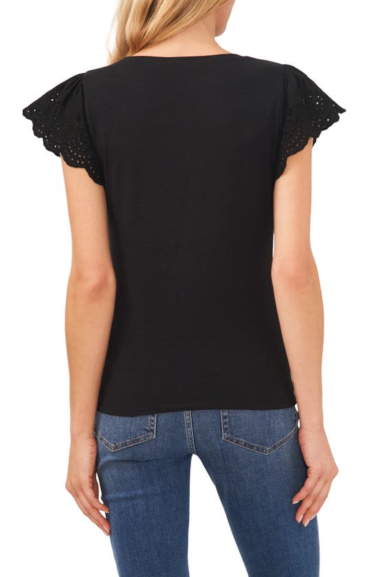 Shop Cece Eyelet Flutter Sleeve T-shirt In Rich Black