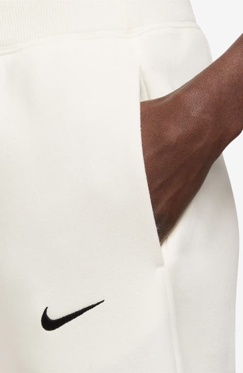 Shop Nike Sportswear Phoenix High Waist Fleece Crop Sweatpants In Sail/black