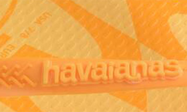 Shop Havaianas Distorted Wave Flip Flop In Caja Yellow