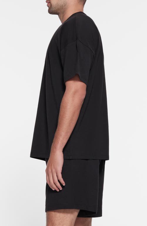 Shop Skims Oversize Stretch Crewneck T-shirt In Obsidian