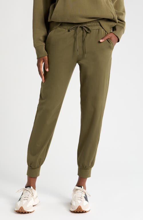 Shop Zella Move In Pocket Joggers In Olive Night