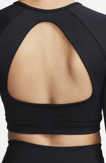 Nike Training Air Mock zip neck cropped medium support sports bra top in  black - ShopStyle