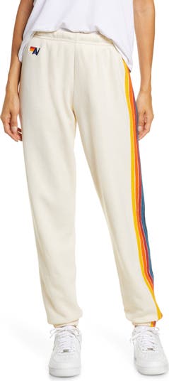 Nike athletic sweatpants store with rainbow stripe