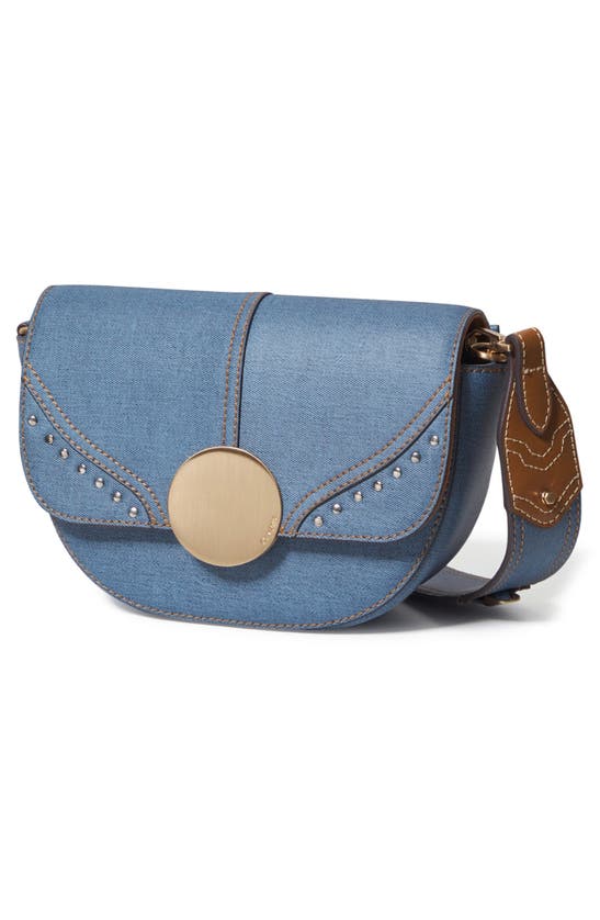 Shop Oryany Lottie Denim Crossbody Bag In Denim Blue