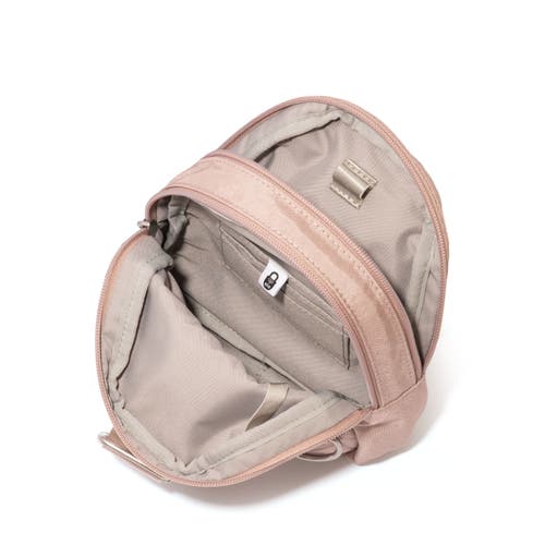 Shop Baggallini Double Zip Mini Sling Bag In Blush Shimmer