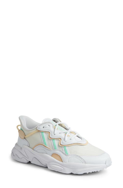 Shop Adidas Originals Adidas Ozweego Sneaker In White/mint/sand Strata