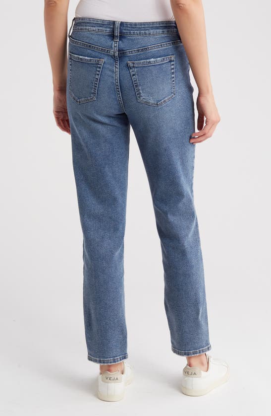 Shop Hint Of Blu Distressed Hem High Waist Slim Straight Leg Jeans In Free Blue