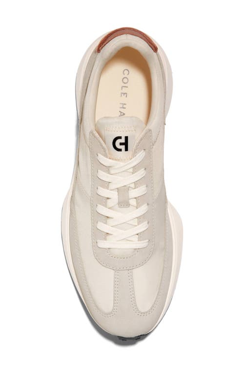 Shop Cole Haan Grand Crosscourt Midtown Sneaker In Ivory/optic White/gum