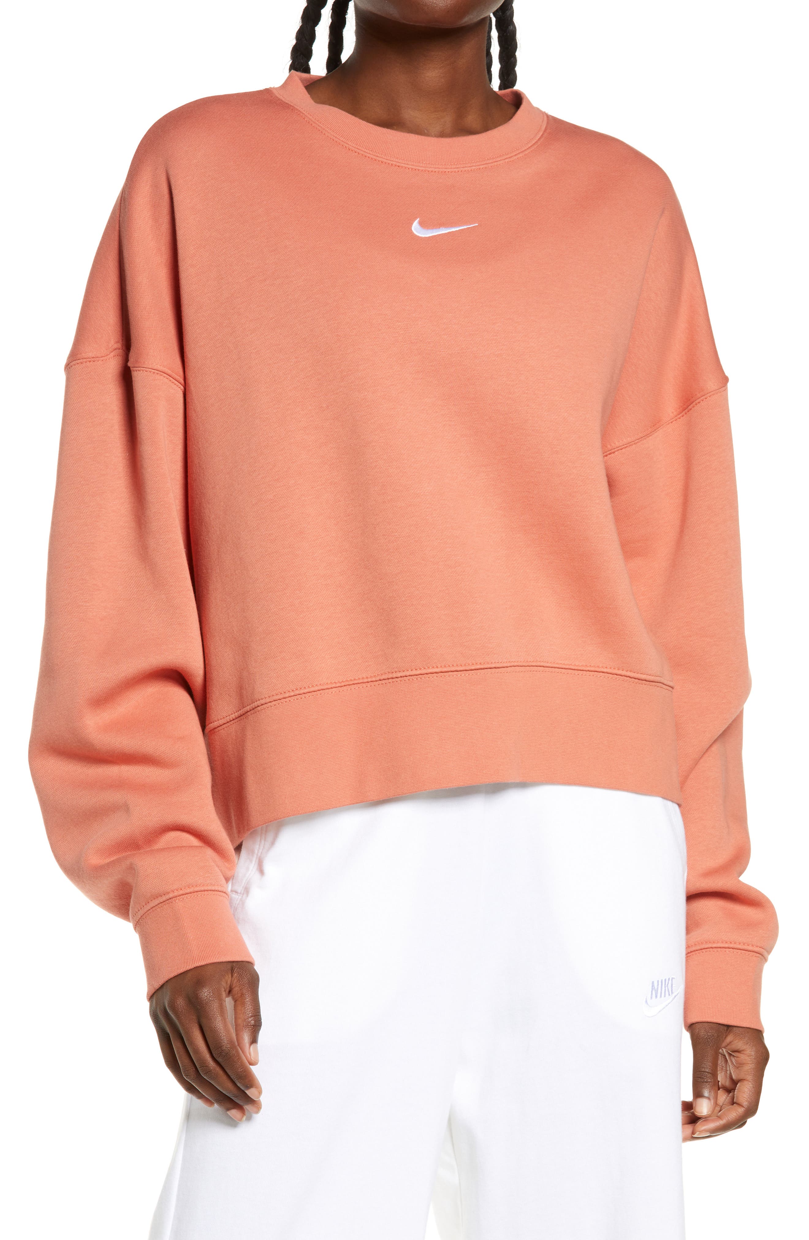 nike mini swoosh oversized sweatshirt in pale coral