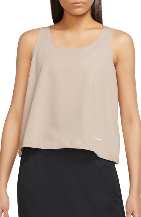 beige nike top
