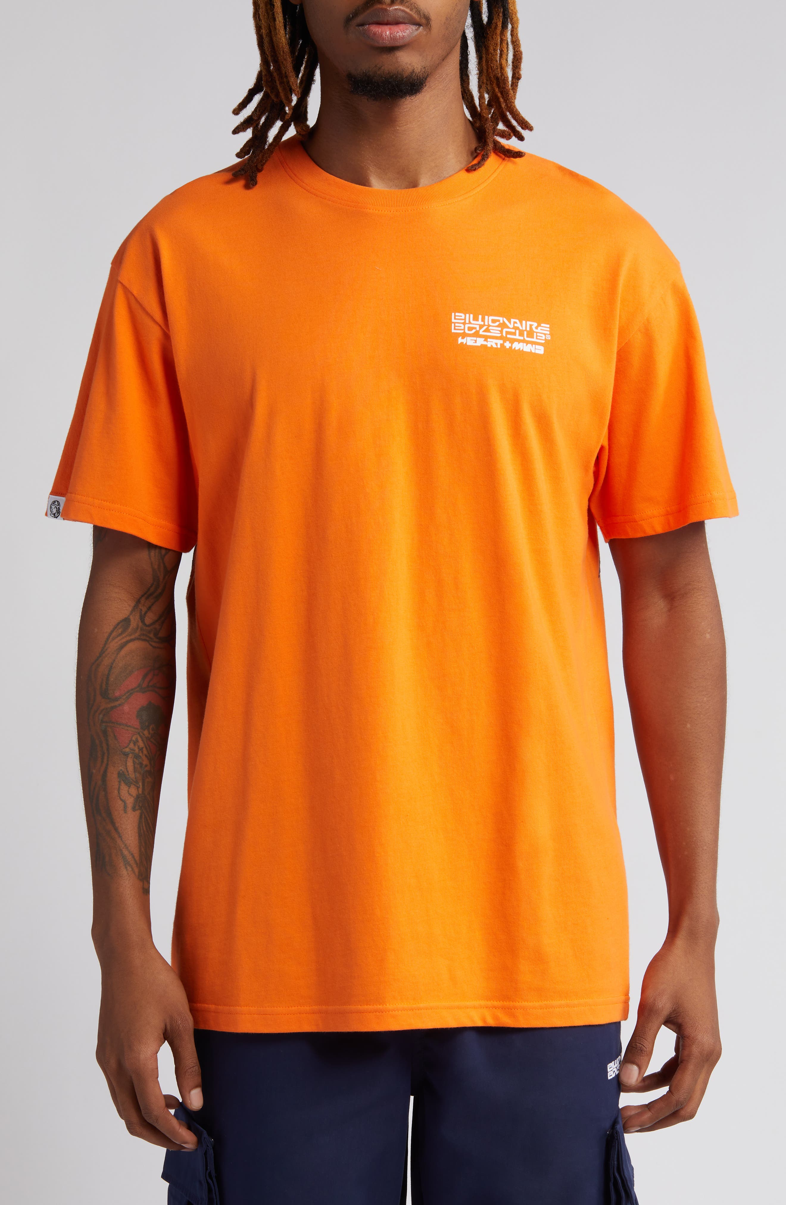 orange white graphic tee