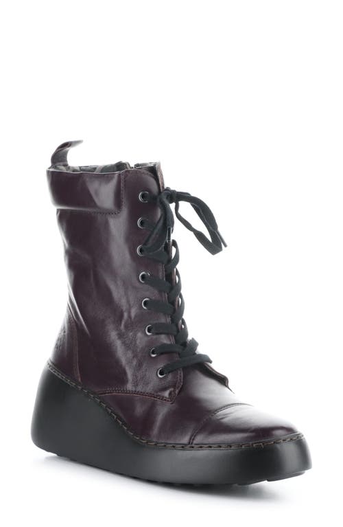 Shop Fly London Daff Wedge Combat Boot In Dark Purple Sofia