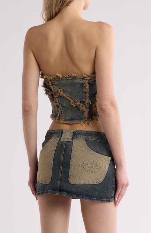 Shop Bdg Urban Outfitters Frayed Edge Strapless Denim Corset In Vintage Denim