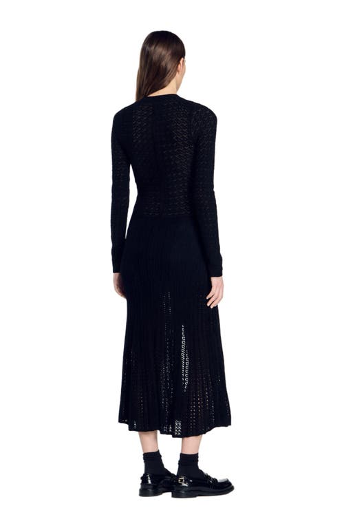 Shop Sandro Velvet-effect Knit Maxi Dress In Black