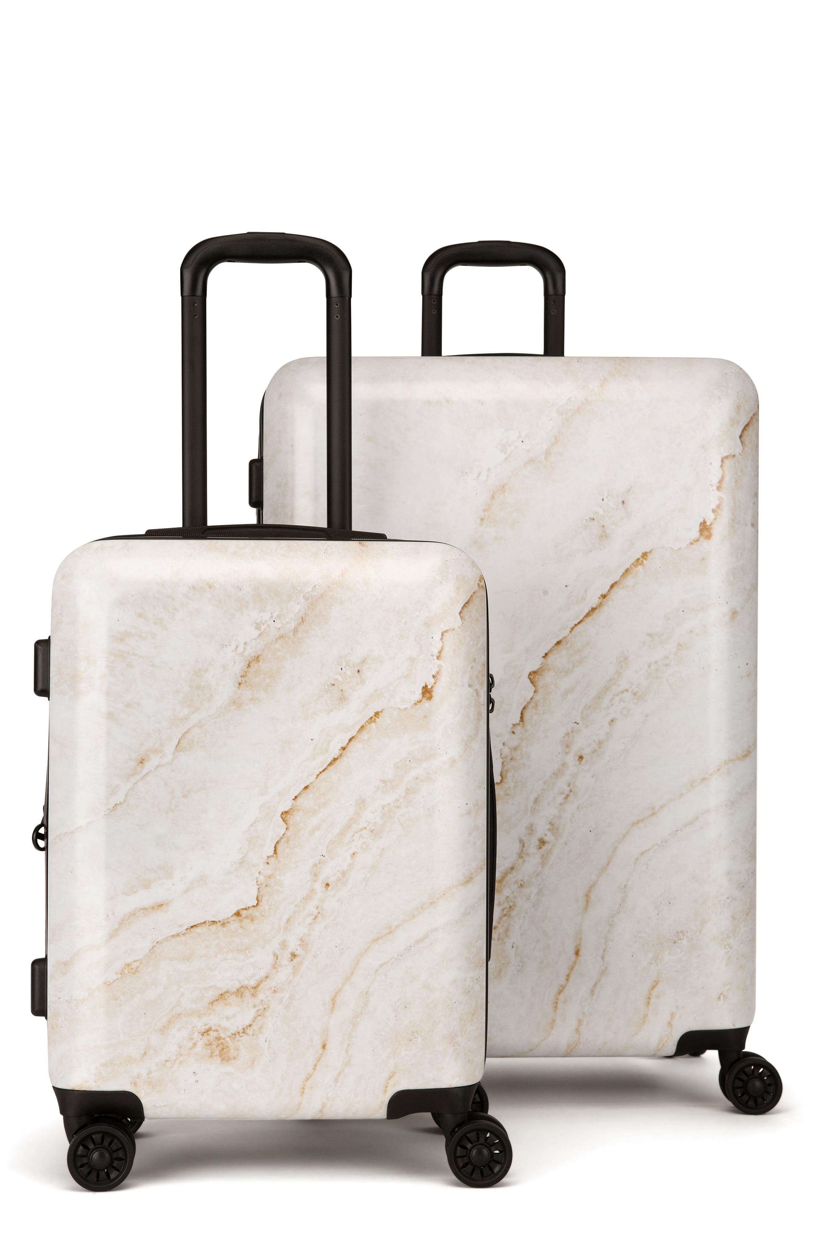 gold hardside luggage