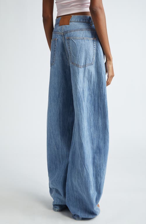 Shop Alexander Wang Low Rise Oversize Rounded Leg Jeans In Vintage Light Indigo