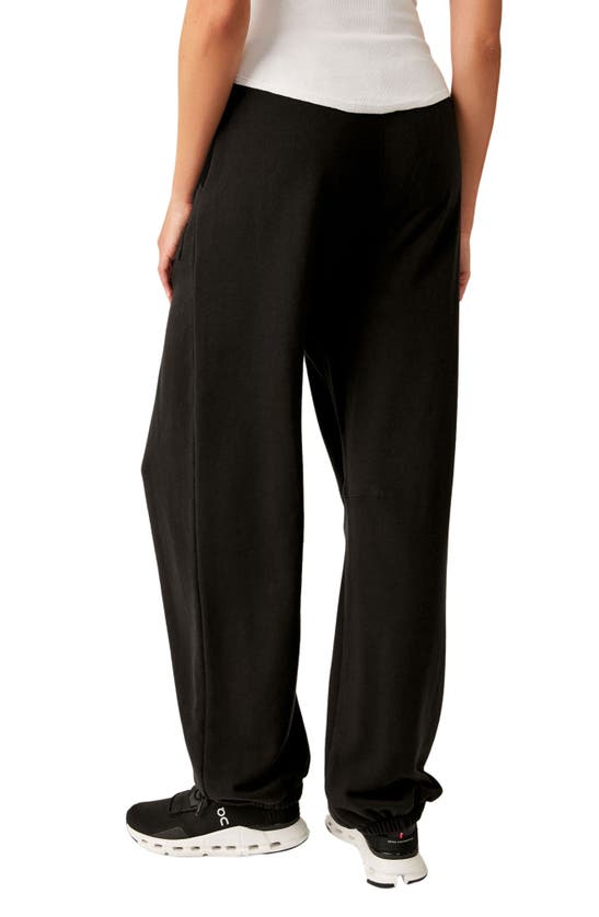 Shop Fp Movement By Free People Warm Down Sweatpants In Black