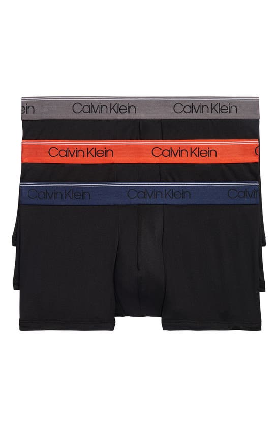 Shop Calvin Klein 3-pack Low Rise Microfiber Stretch Trunks In Black/charcoal/red/blue