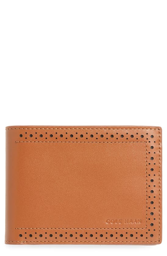 Shop Cole Haan Brogue Leather Passcase In Tan