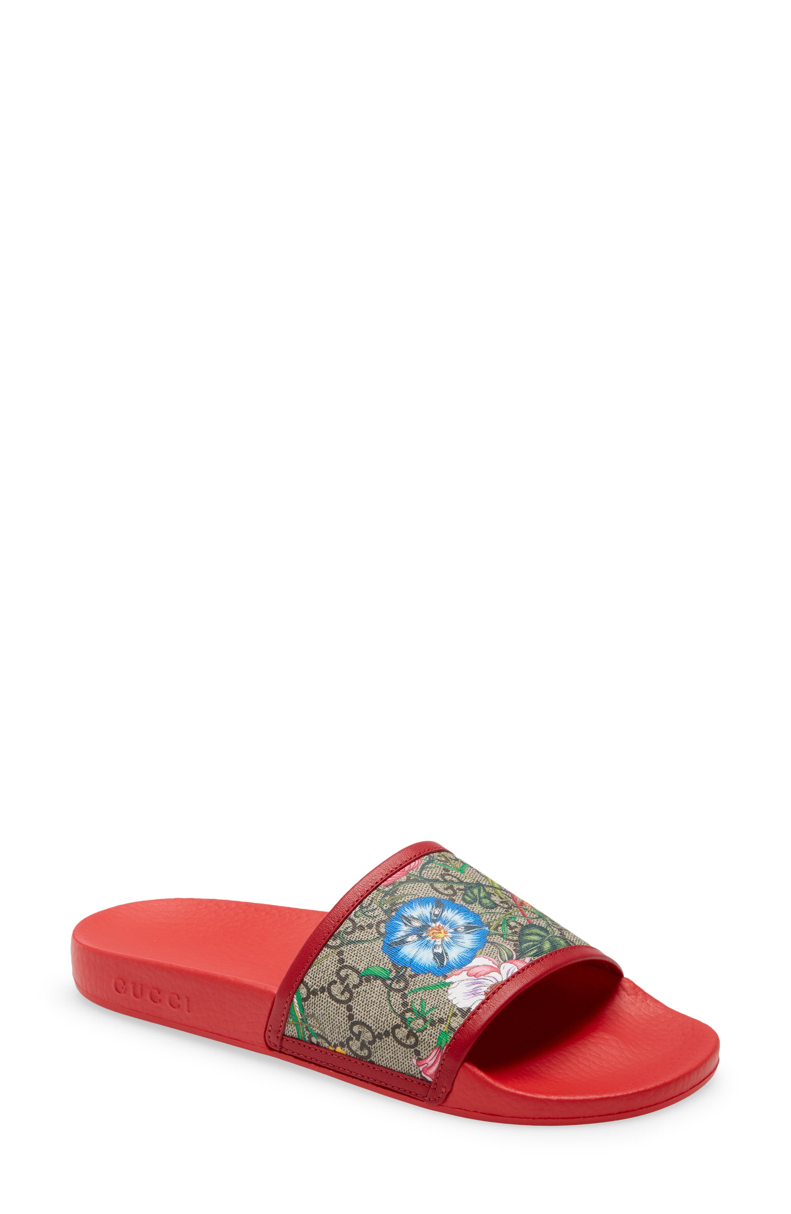 white floral gucci slides