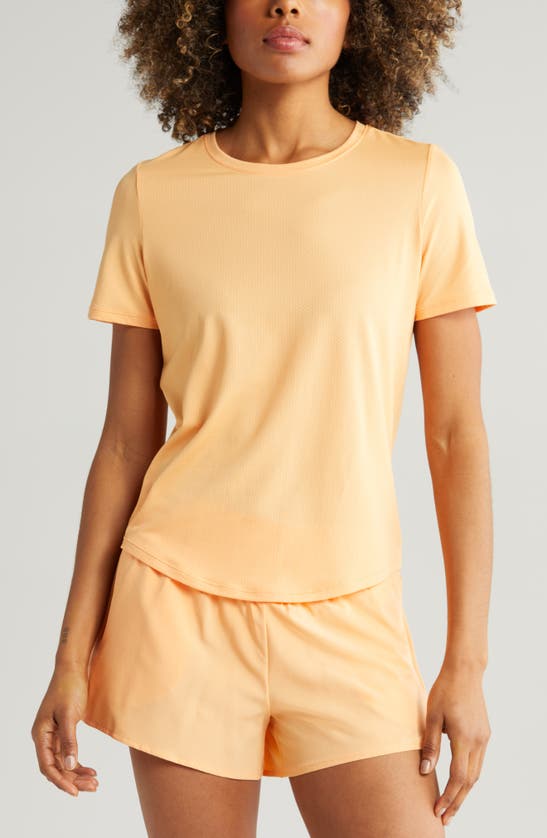 Shop Zella Motivate Perforated Crewneck T-shirt In Coral Beads