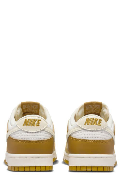 Shop Nike Dunk Low Retro Basketball Sneaker In Bronzine/coconut Milk/gold