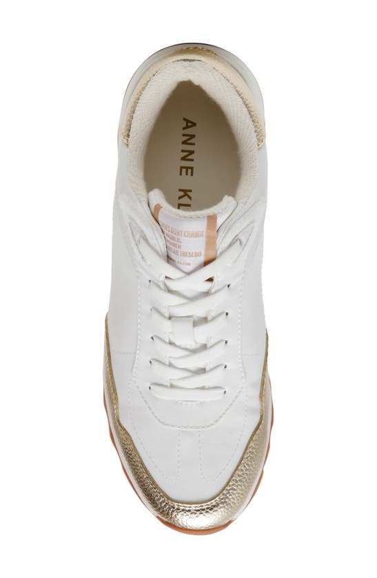 Shop Anne Klein Restless Wedge Sneaker In White Multi