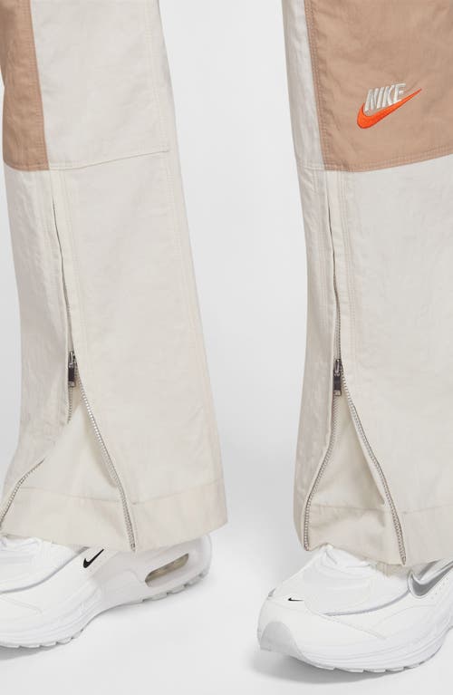 Shop Nike City Utility Zip Cuff Track Pants In Light Orewood Brown/hemp