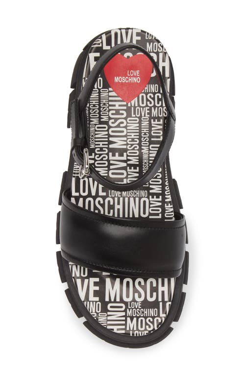 Shop Love Moschino Ankle Strap Platform Lug Sole Sandal In Black/logone/white