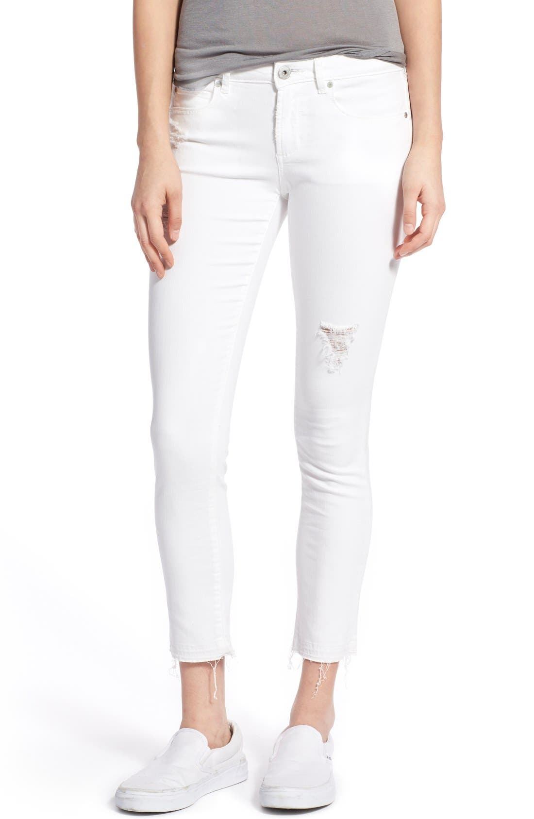 white pants with frayed hem