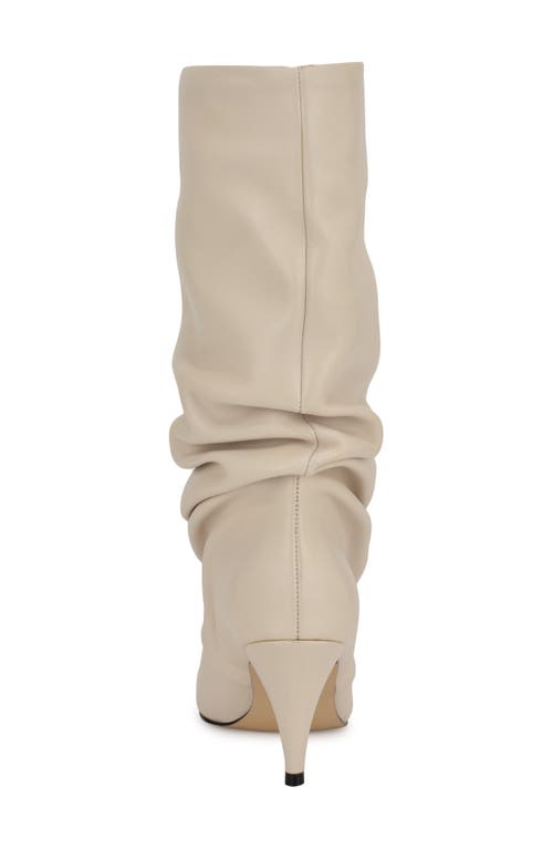 Shop Nine West Primer Slouch Pointed Toe Boot In Ivory