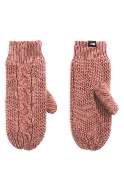 Click to view more detailed imagery on our partner's website The North Face Minna Cable Knit Mittens In Pink Clay