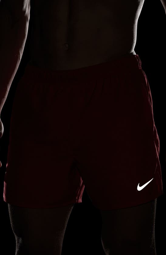 Shop Nike Dri-fit Challenger 5-inch Brief Lined Shorts In University Red/ Silver