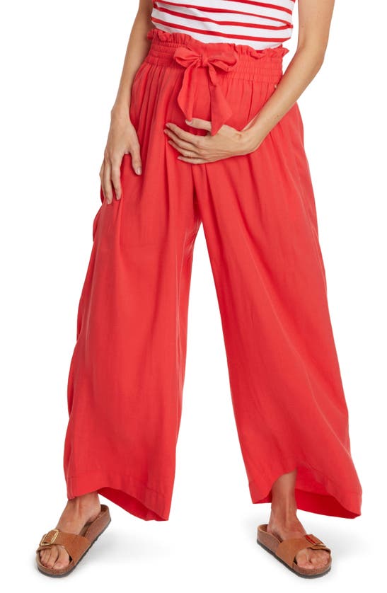 Shop Cache Coeur Sahel Smocked Twill Maternity Pants In Coral
