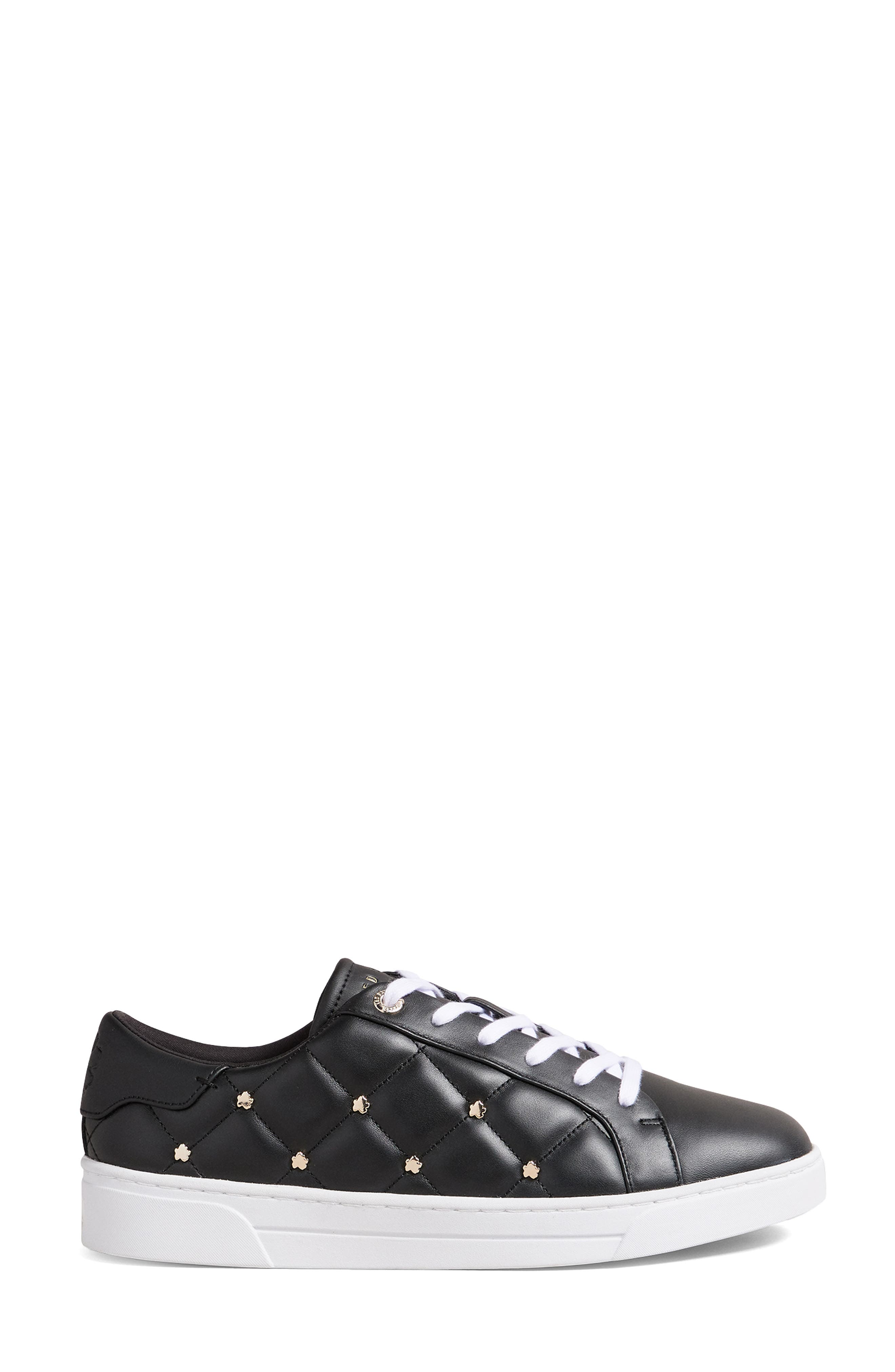black leather quilted sneakers