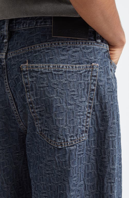 Shop Acne Studios 1981m Monogram Baggy Jeans In Blue/black