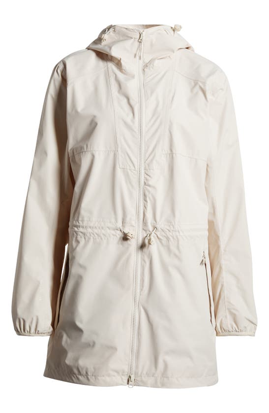Shop Helly Hansen Essence Waterproof Raincoat In Cream