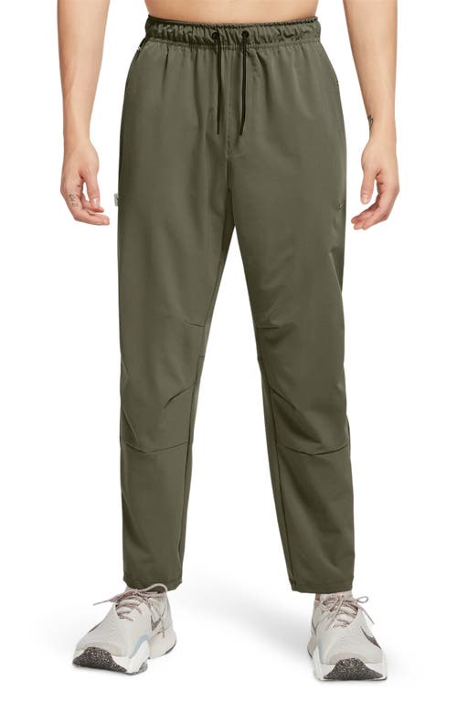 Nike Dri-fit Unlimited Drawstring Pants In Medium Olive/black