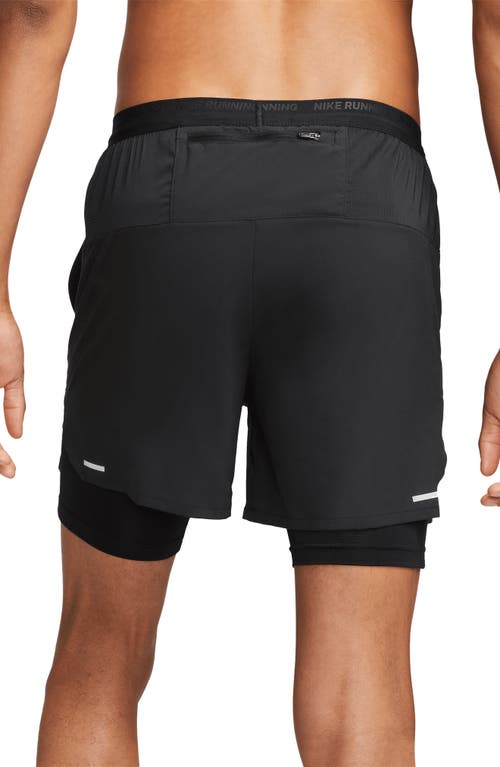 Shop Nike Dri-fit Stride Hybrid Running Shorts In Black/black/black