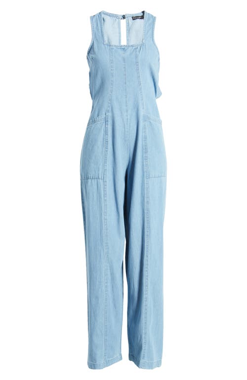 Shop Nasty Gal Ruffle Cutout Chambray Jumpsuit In Authentic Midwash