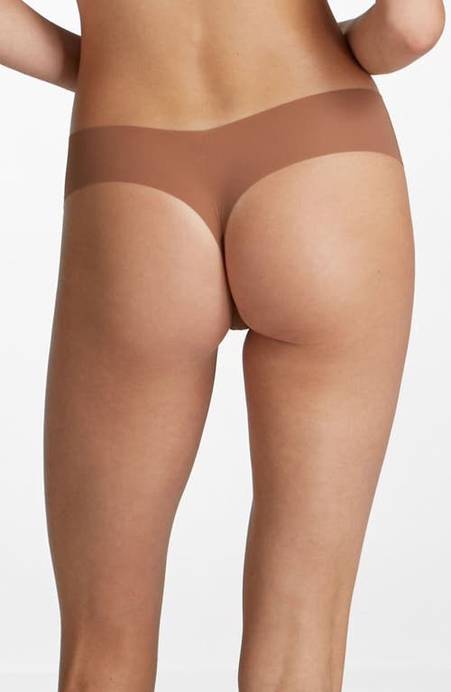 Shop Commando Invisible Rib Thong In Caramel