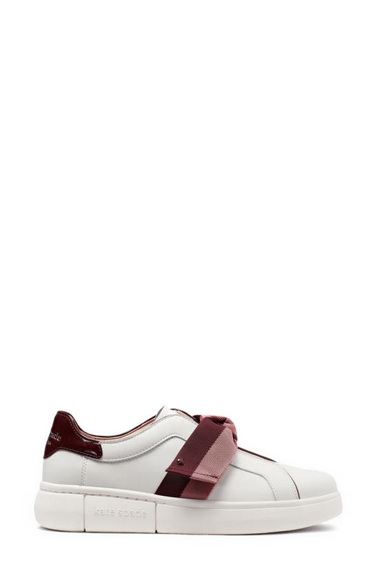 Shop Kate Spade Lexi Sneaker In Optic White/ Cordovan
